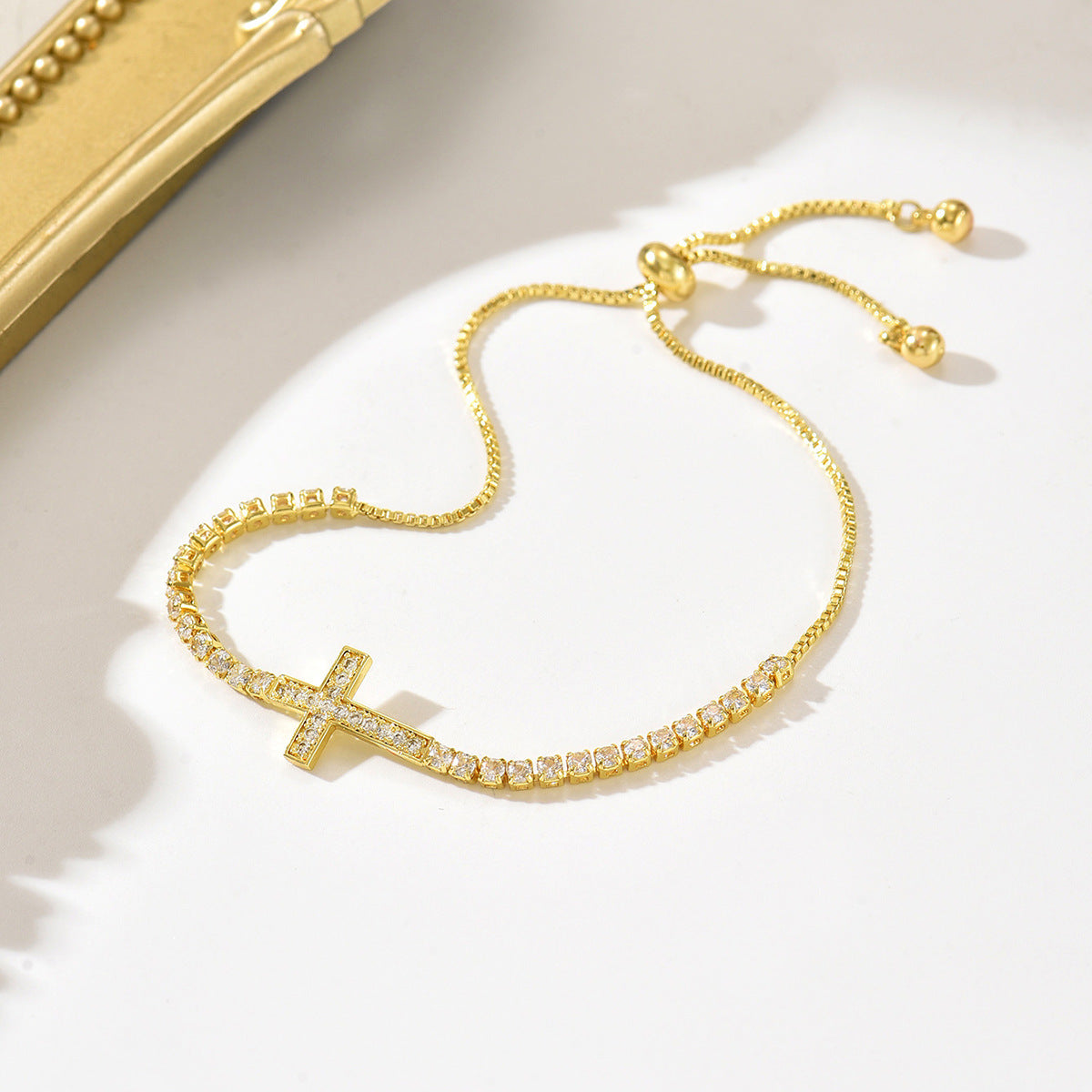 Agnès Gold Sideways Cross Bracelet