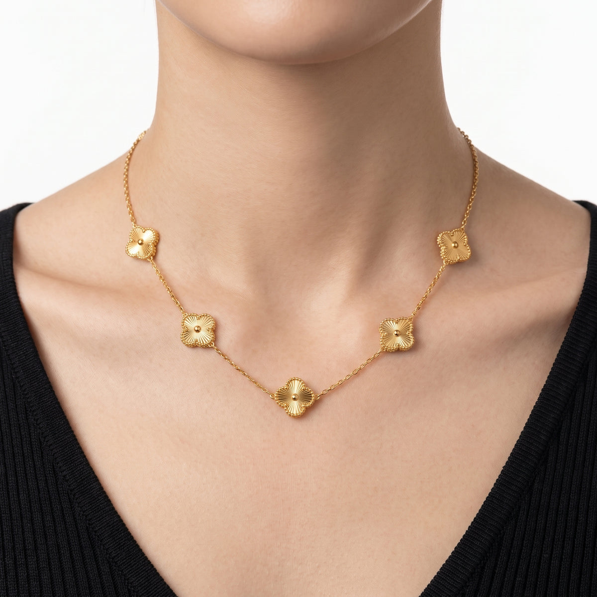 Close-up of the Lelice Adèle Gold Necklace at the collarbone