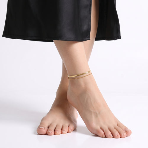 Feet crossed while standing, wearing the Adeline Classic Anklet