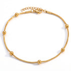 Lelice Amara Beaded Glow Anklet in gold on a white background