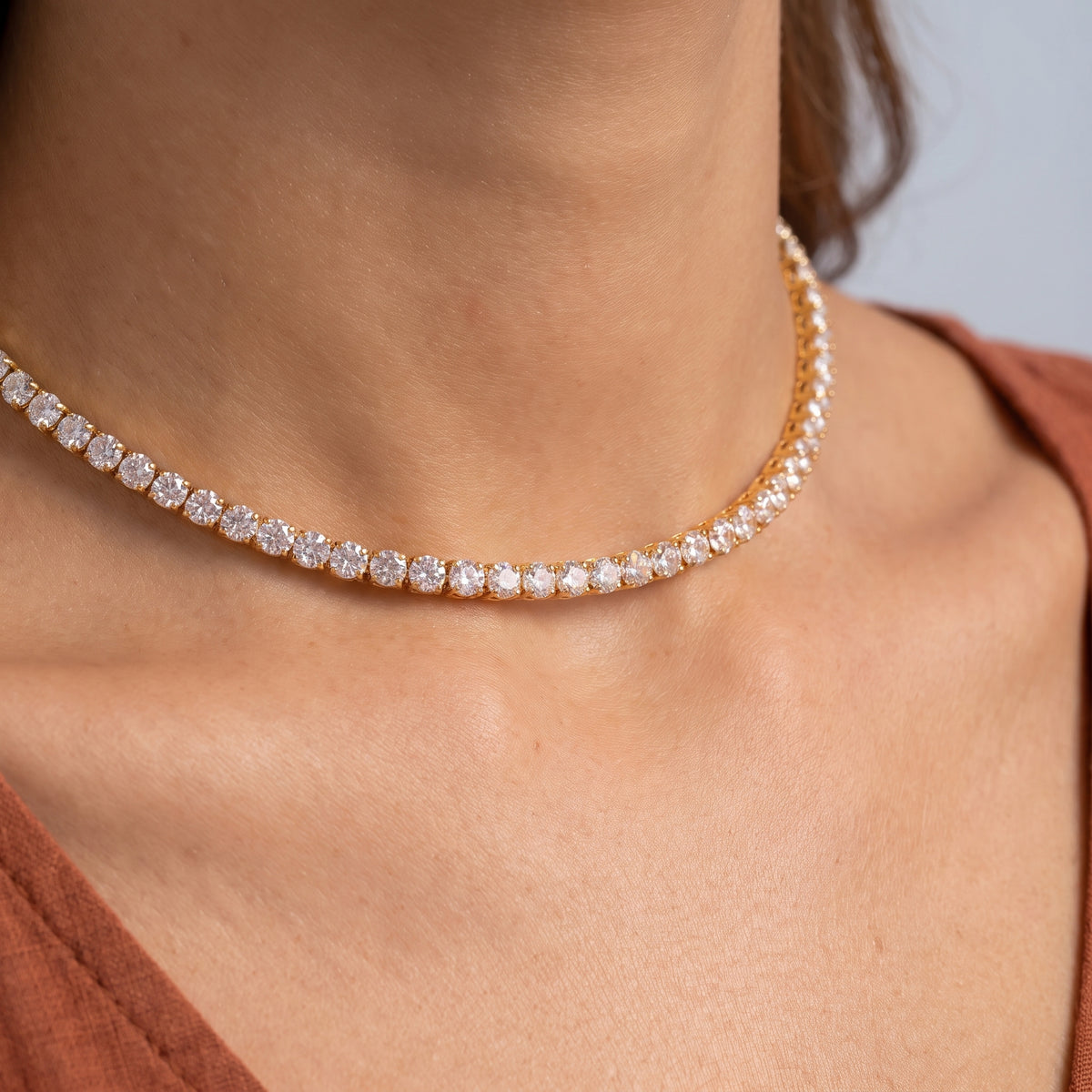 Close-up of the Amira Crystal Choker resting on the skin