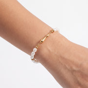 Close-up of the Lelice Ana Pearl Bracelet in gold on the wrist