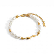 Lelice Ana Pearl Bracelet in gold on a white background
