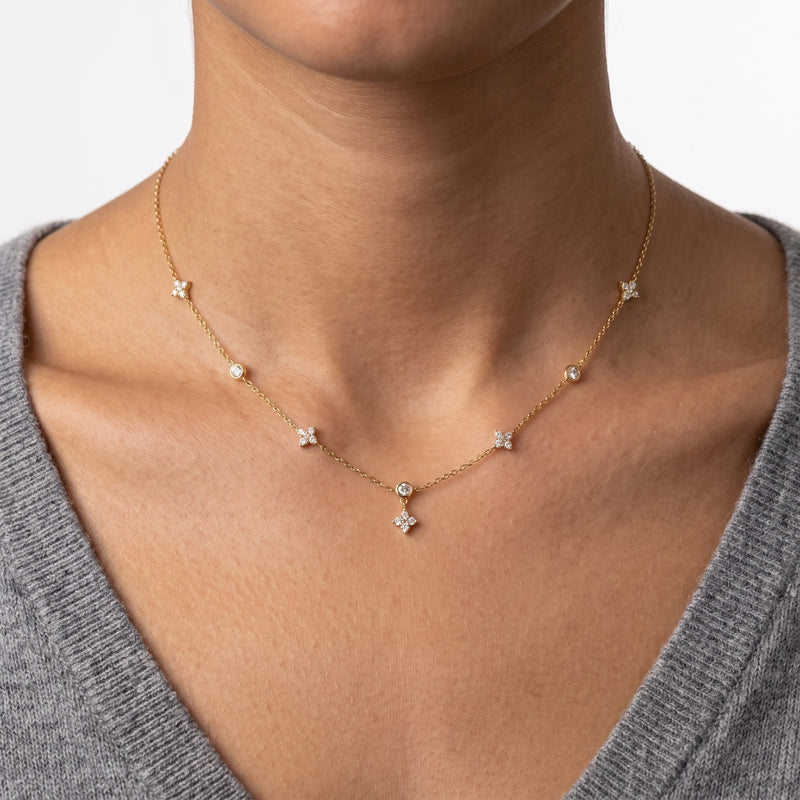 Close-up of the Lelice Aria Dainty Necklace in gold at the collarbone
