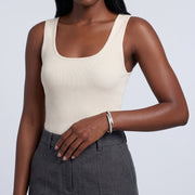 Model wearing the Lelice Astrid Silver Bangle, hand resting at the waist