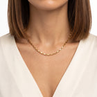 Woman wearing Lelice gold box chain necklace Aurélie