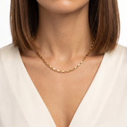 Woman wearing Lelice gold box chain necklace Aurélie