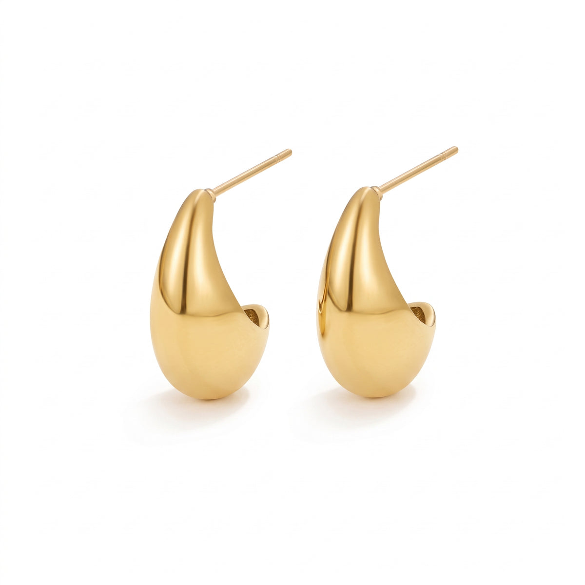 Lelice Ava Curved Hoops in gold on a white background