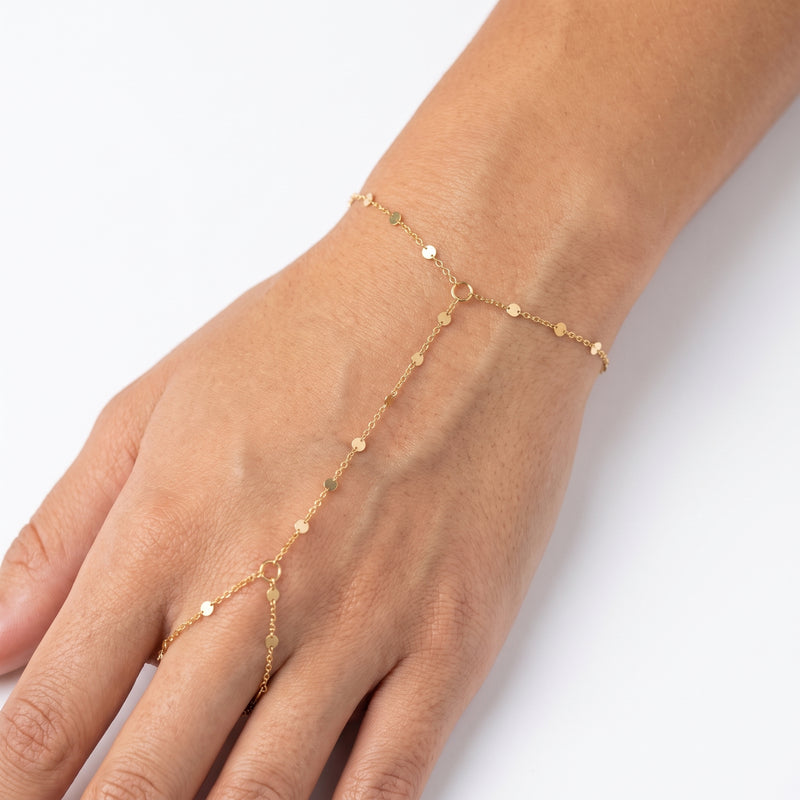 Close-up of the Lelice Blair Chain Bracelet in gold on the wrist and hand