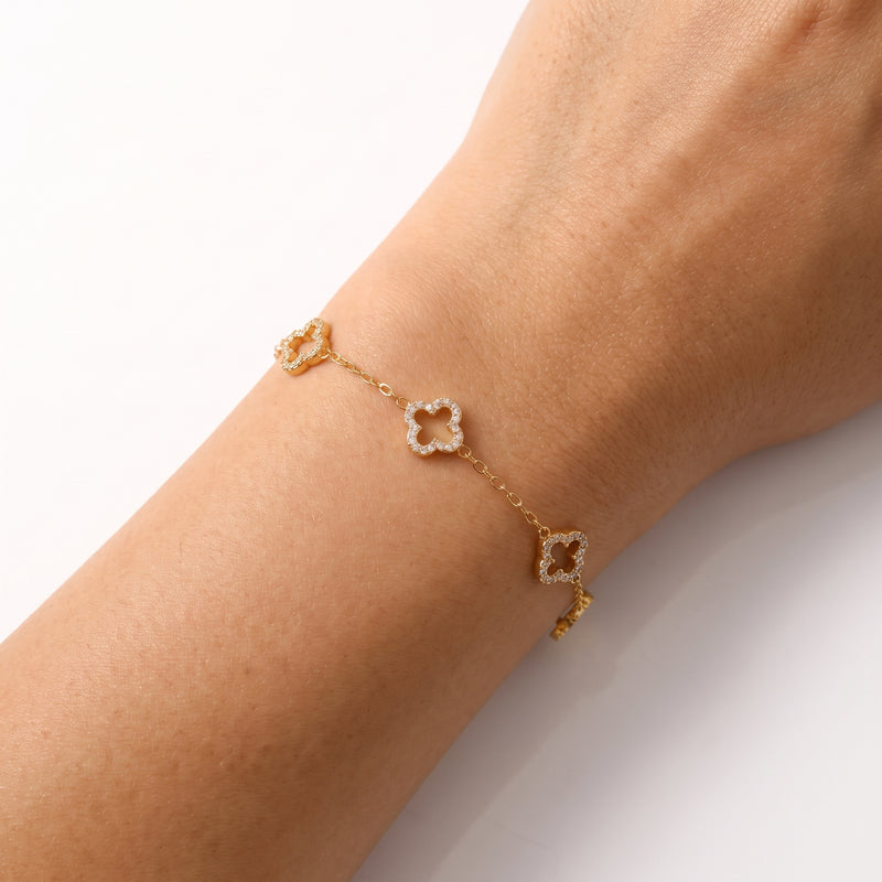 Close-up of the Lelice Chloé Clover Bracelet in gold on the wrist