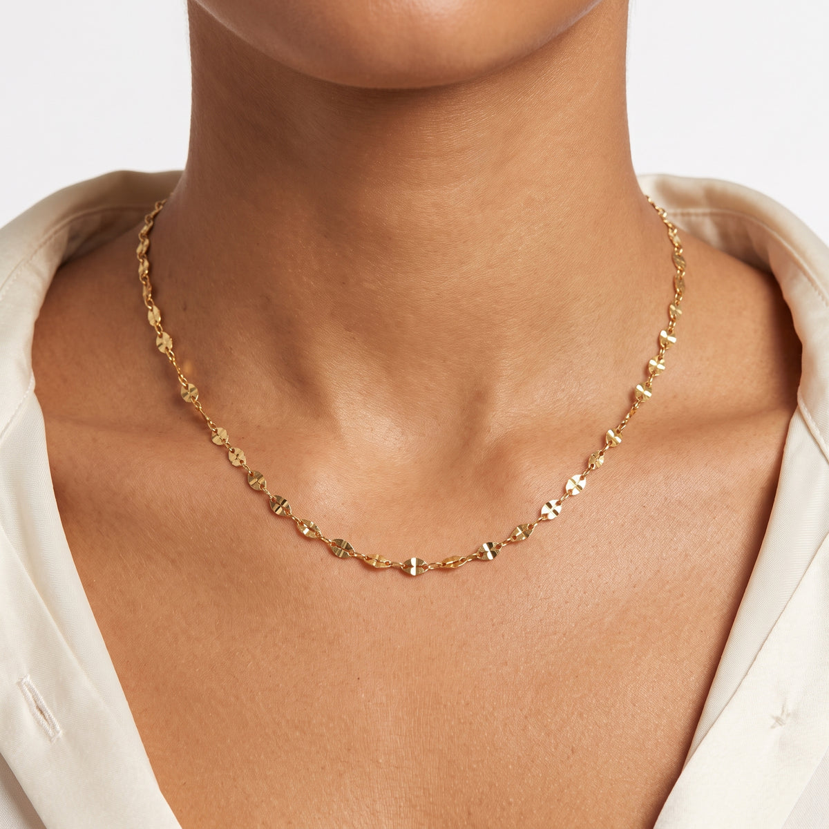 Close-up of the Lelice Cleo Fine Choker Necklace in gold at the collarbone