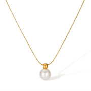 Lelice Cora Pearl Drop Necklace in gold on a white background