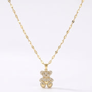 Lelice Crystal Teddy Bear Necklace in gold on a white background