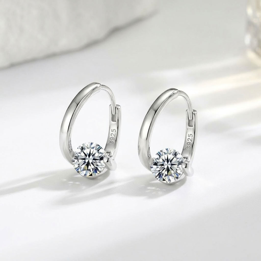 Maëlle Silver Solitaire Huggies