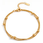 Lelice Elara Double Strand Anklet in gold on a white background