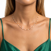 Close-up of the Lelice Eleni Beaded Necklace in gold at the collarbone