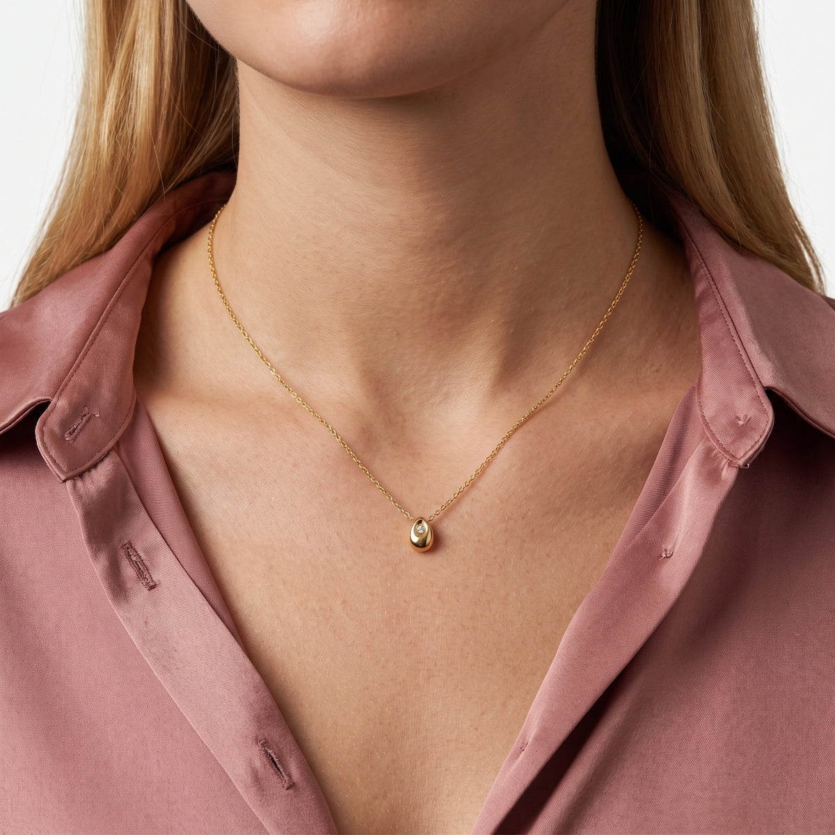 Close-up of the Lelice Eleni Petite Necklace in gold at the collarbone