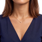 Close-up of the Lelice Elise Pearl Necklace in gold at the collarbone