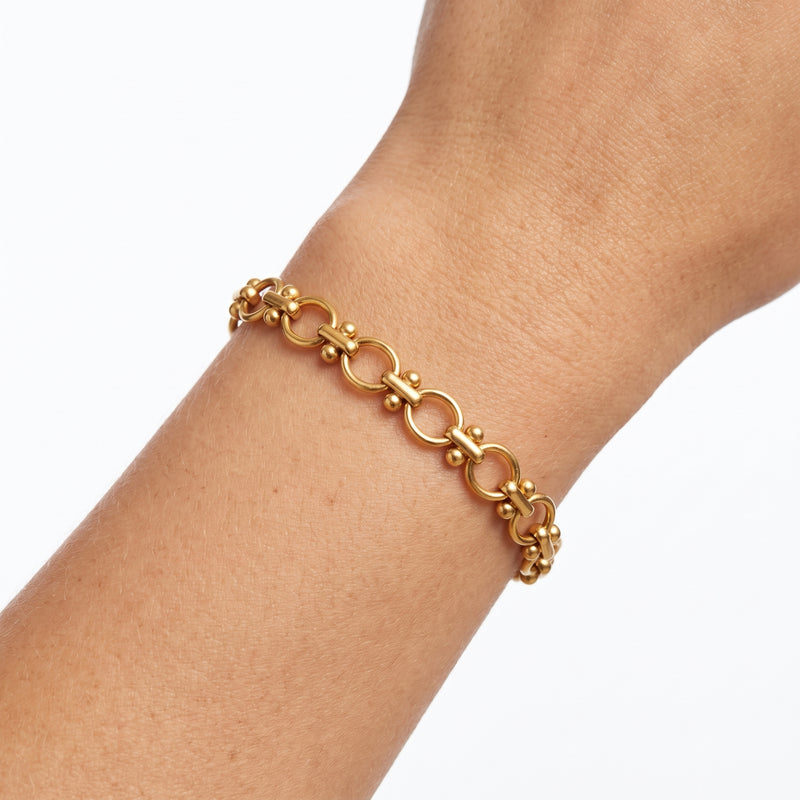 Close-up of the Lelice Emma Link Bracelet in gold on the wrist