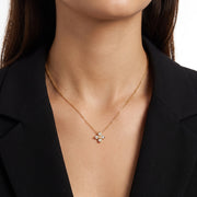 Close-up of the Lelice Esme Clover Necklace in gold at the collarbone
