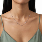 Close-up of the Lelice Esther Sparkle Necklace in silver at the collarbone