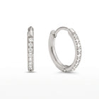 Lelice Evelyn Infinity Hoops in silver on a white background
