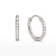 Lelice Evelyn Infinity Hoops in silver on a white background