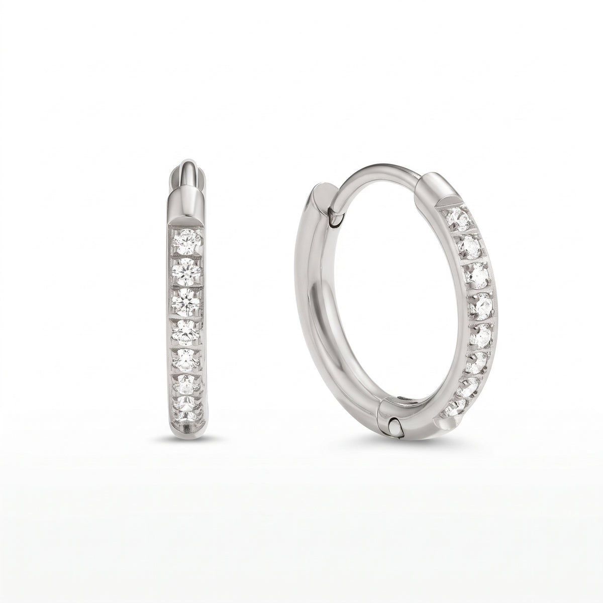 Lelice Evelyn Infinity Hoops in silver on a white background