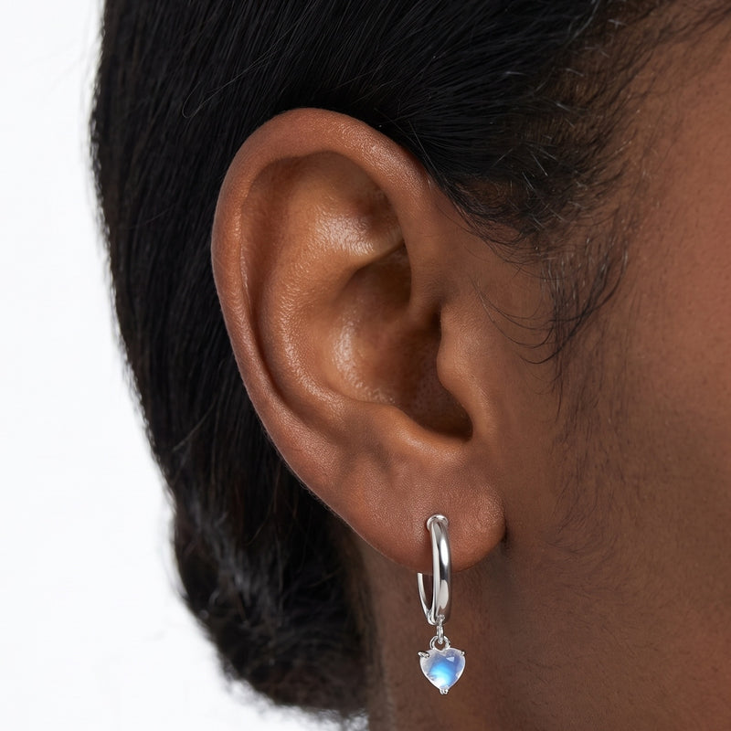Close-up of the Lelice Florence Silver Hoops in silver on the ear