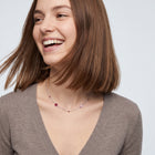 Laughing woman wearing the Geneva Zircon Necklace
