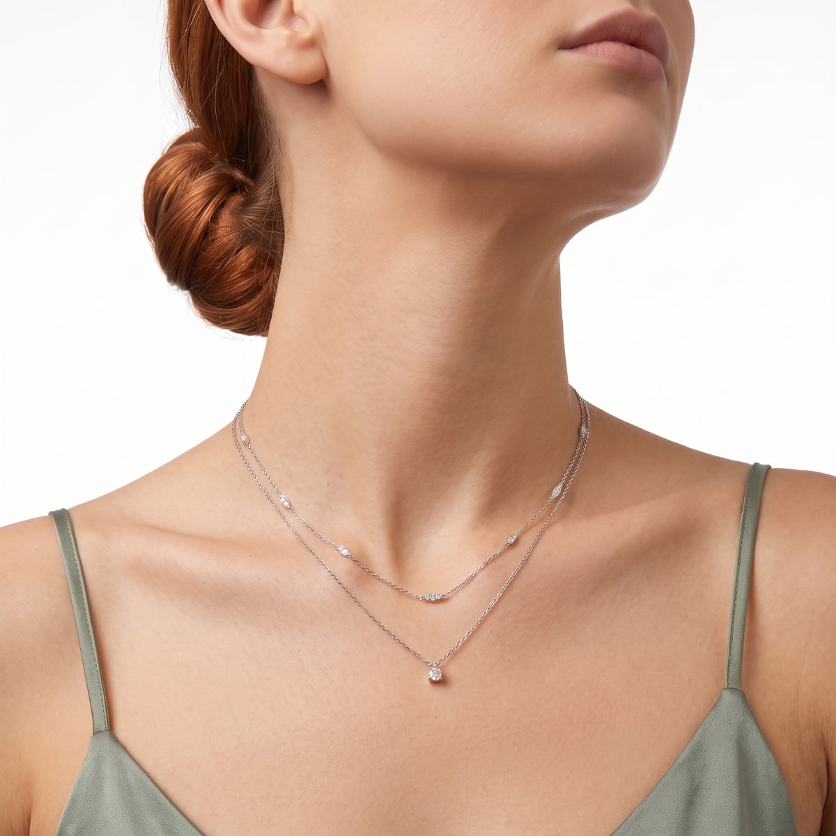 Low-angle view of woman wearing Grace silver layered necklace