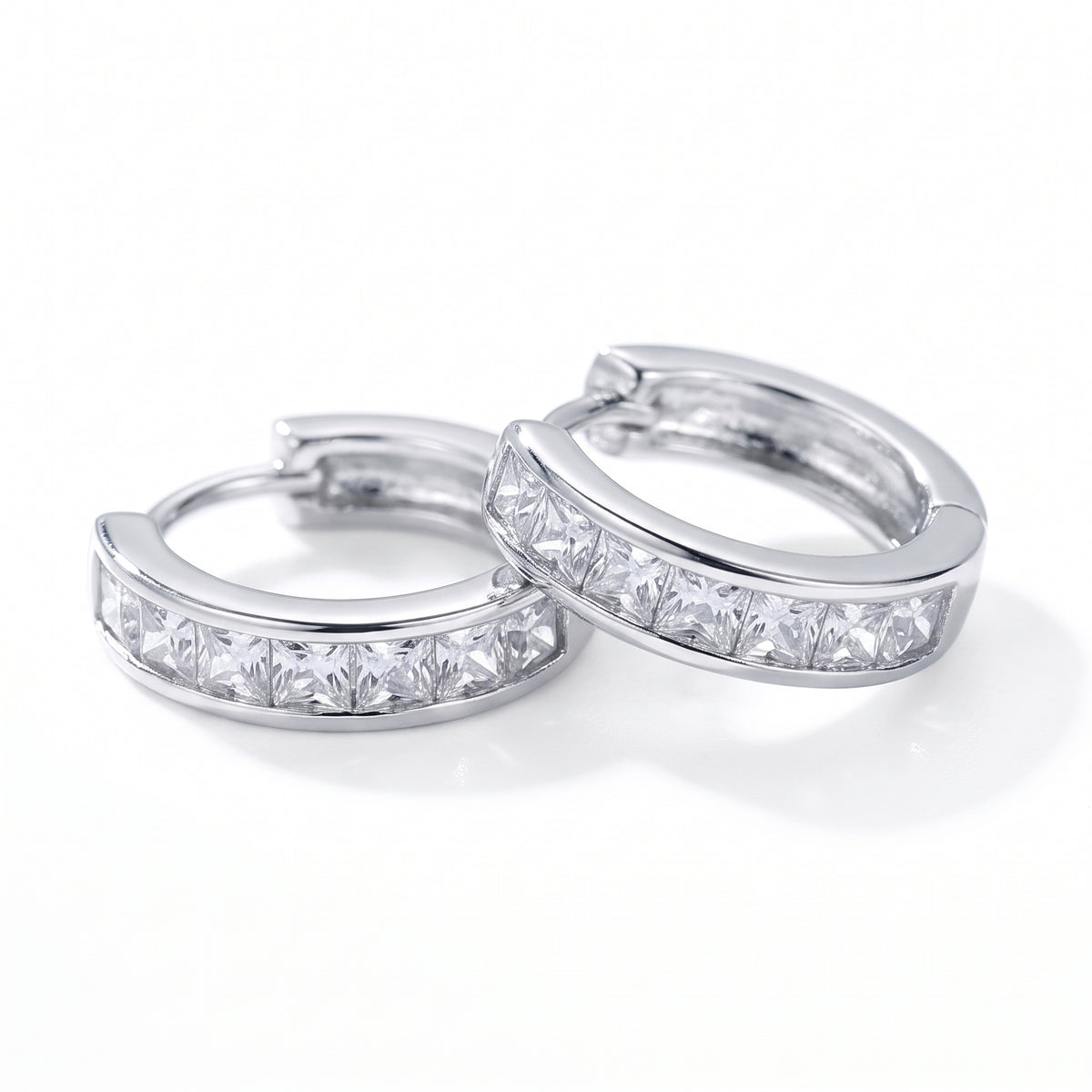 Lelice Isla Silver Square Crystal Huggie Hoop Earrings on a white background
