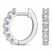 Lelice silver crystal huggie hoop earrings Julia on a white background
