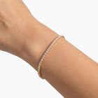 Close-up of the Lelice Julia Tennis Bracelet in gold on the wrist