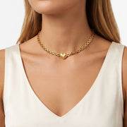 Close-up of the Lelice Juliet Heart Choker in gold at the collarbone
