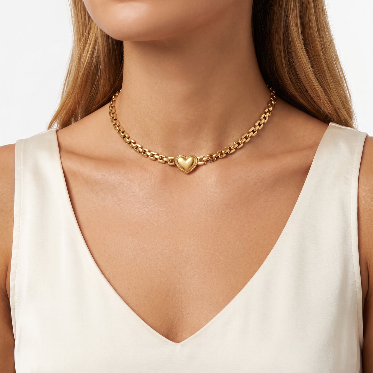 Close-up of the Lelice Juliet Heart Choker in gold at the collarbone