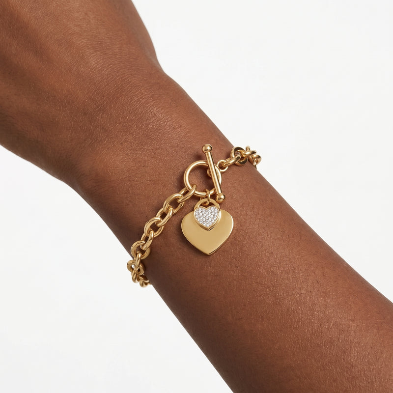Close-up of the Lelice Bea Chunky Heart Bracelet in gold on the wrist