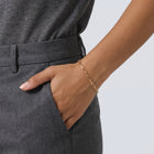 Model wearing the Lelice Classic Paperclip Chain in gold, hand in the trouser pocket