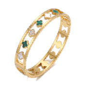 Lelice Dublin Quatrefoil Gold Bangle on a white background