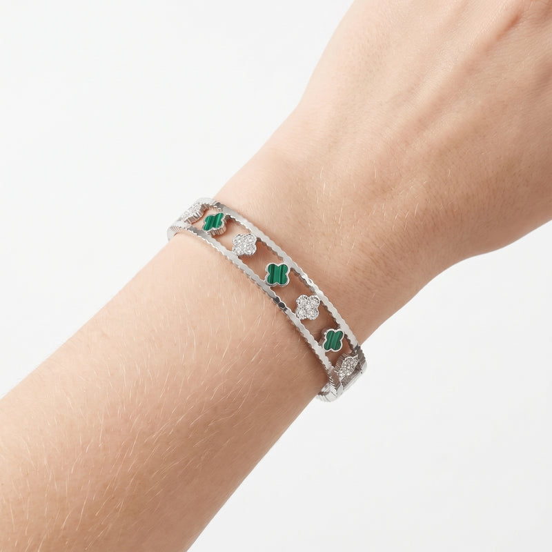 Close-up of the Lelice Dublin Quatrefoil Silver Bangle on the wrist