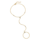 Lelice Lyra Crystal Hand Chain in gold on a white background