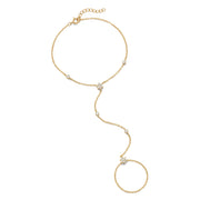 Lelice Lyra Crystal Hand Chain in gold on a white background
