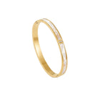 Lelice Lyra Cuff Bangle in gold on a white background