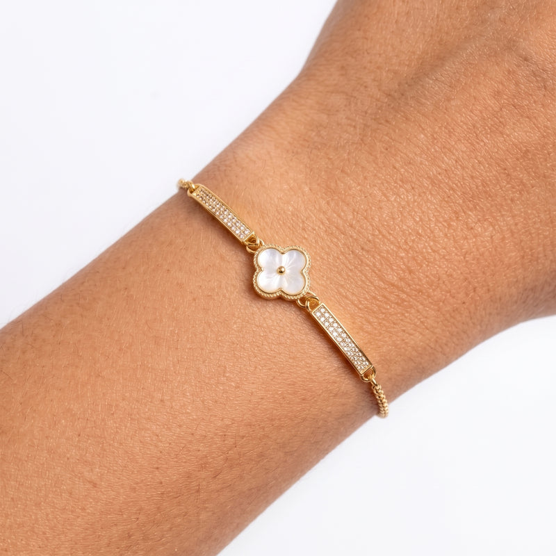 Close-up of the Lelice Pavé Petal Bracelet in gold on the wrist