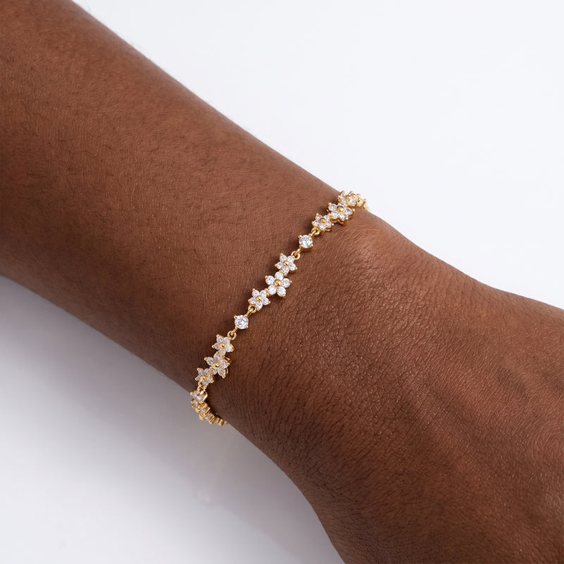 Close-up of the Lelice Stardust Petal Bracelet in gold on the wrist