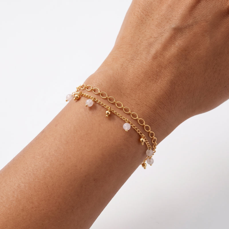 Close-up of the Lelice Lola Charm Bracelet in gold on the wrist