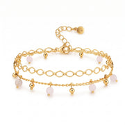 Lelice Lola Charm Bracelet in gold on a white background
