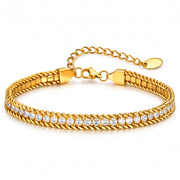Lelice Lumière Woven Anklet in gold on a white background