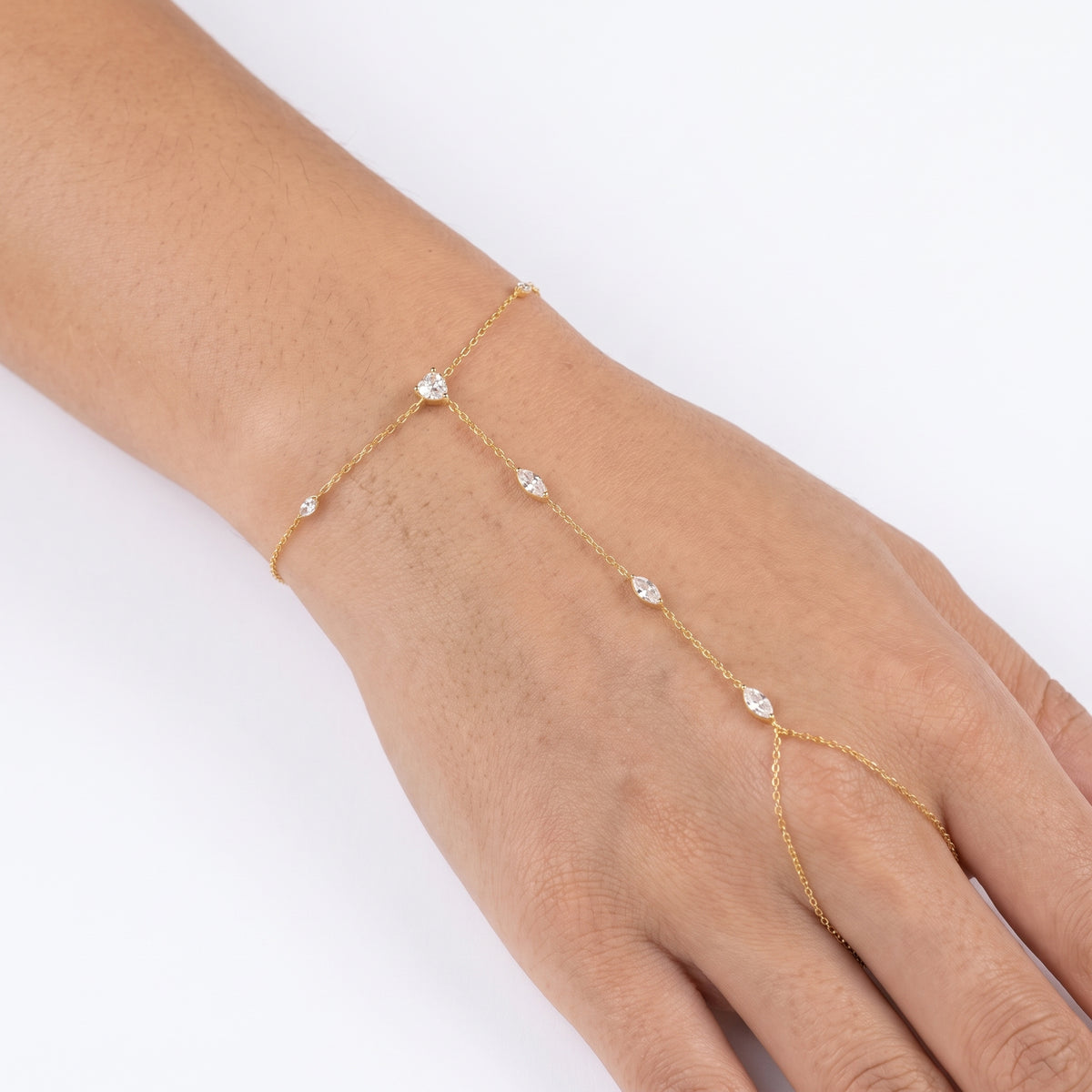 Close-up of the Lelice Margaux Sparkle Bracelet in gold on the wrist and hand
