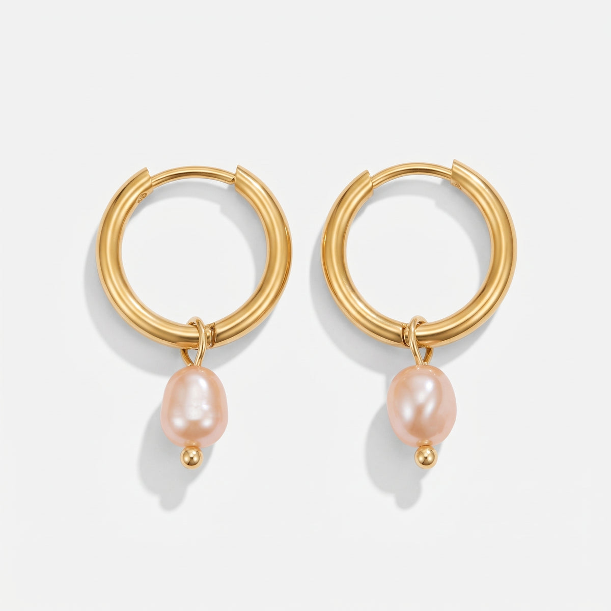 Lelice Marie Pearl Earrings in gold on a white background